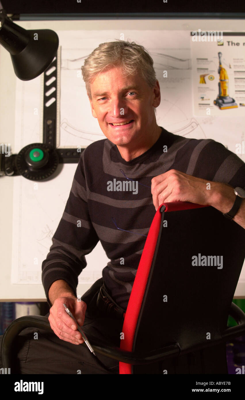 VACUUM CLEANER INVENTOR JAMES DYSON IN HIS OFFICE AT THE DYSON FACTORY
