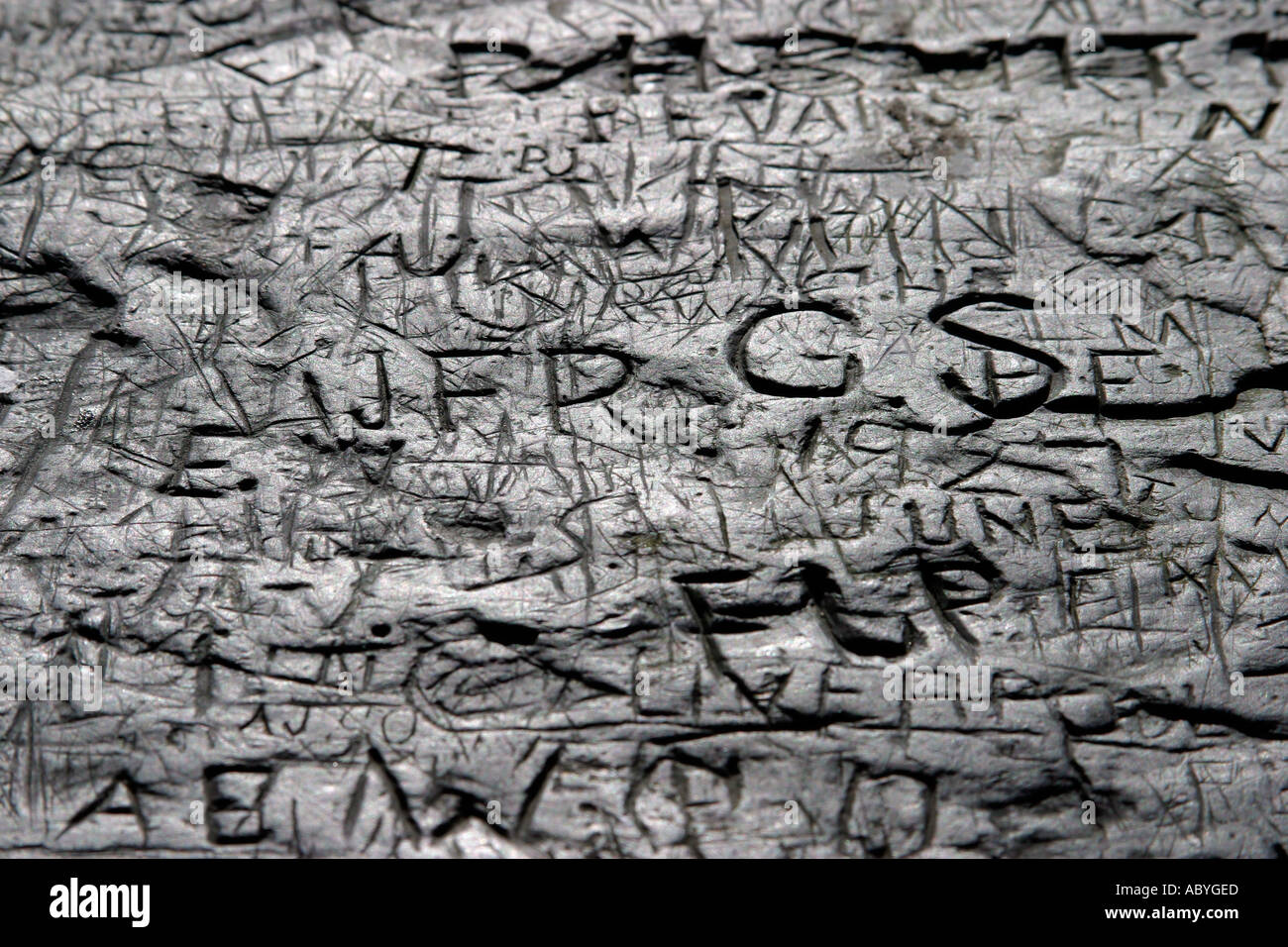 Graffiti on Old Slate Block Stock Photo