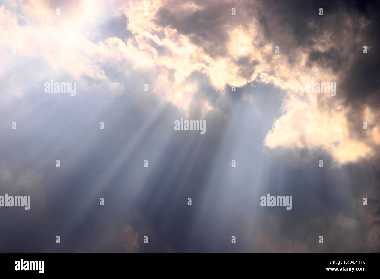 Sun rays through ominous clouds hi-res stock photography and images - Alamy