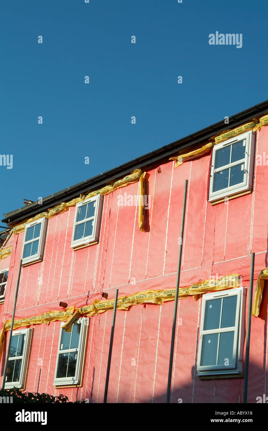 insulation house housing construction thermal barrier green efficient heat heating warm home rockwool fibreglass environment env Stock Photo