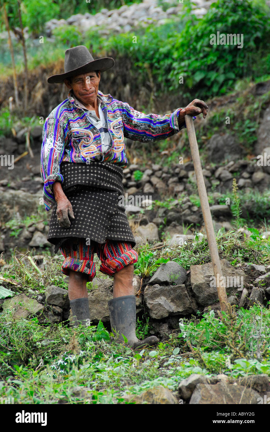 Indigenous man working on field, San Antonio Palopo, Lake Atitlan, Guatemala, Central America Stock Photo