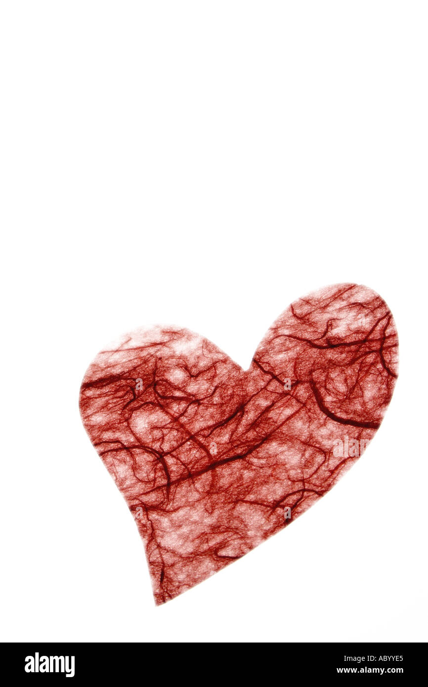Red paper heart on bright white background Stock Photo - Alamy