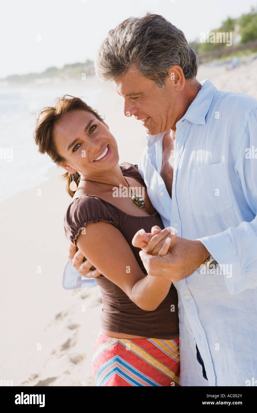 Couple dancing on beach Stock Photo - Alamy
