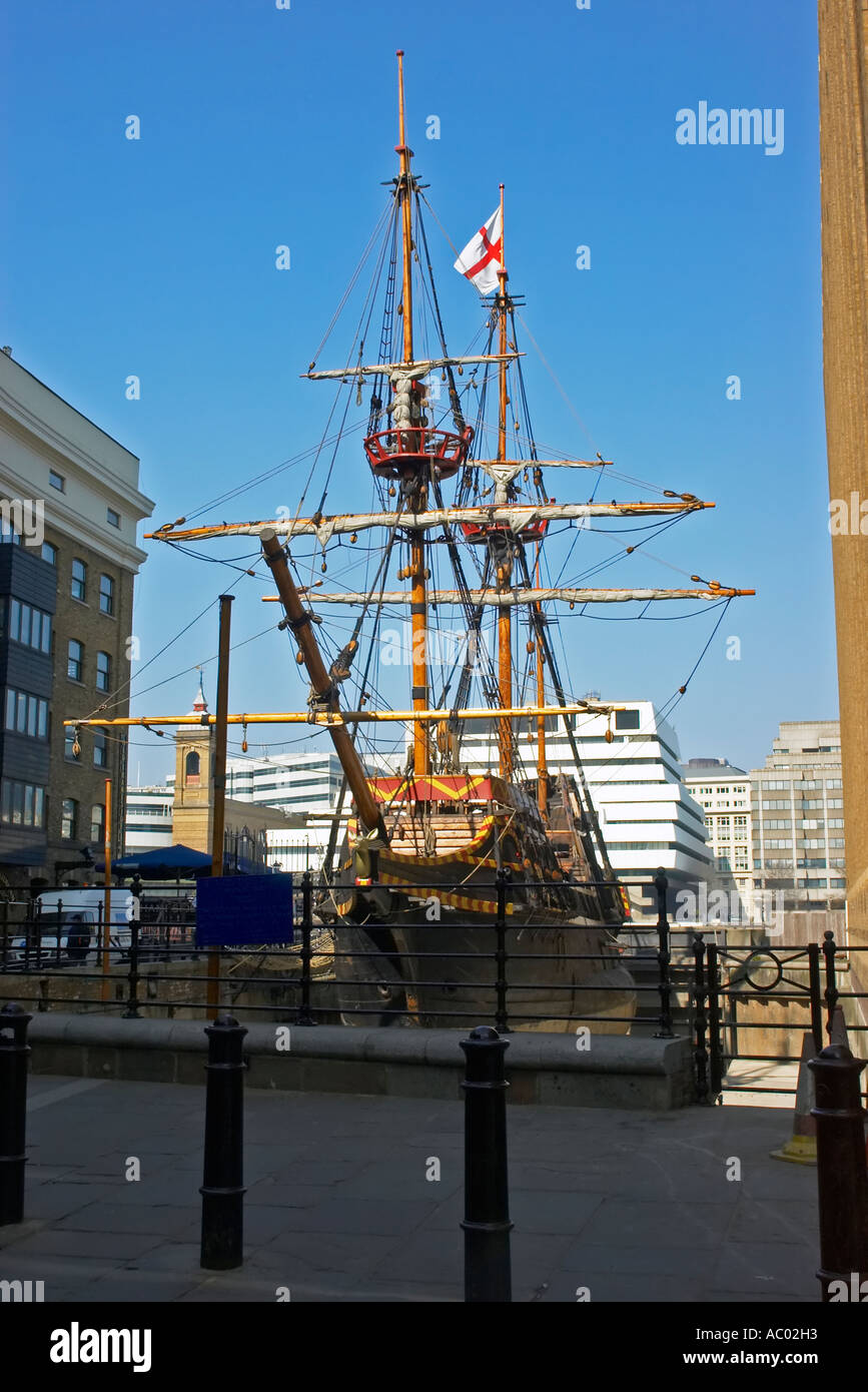 Golden Hinde replica ship moored on the River Thames London UK amongst modern buildings Stock Photo