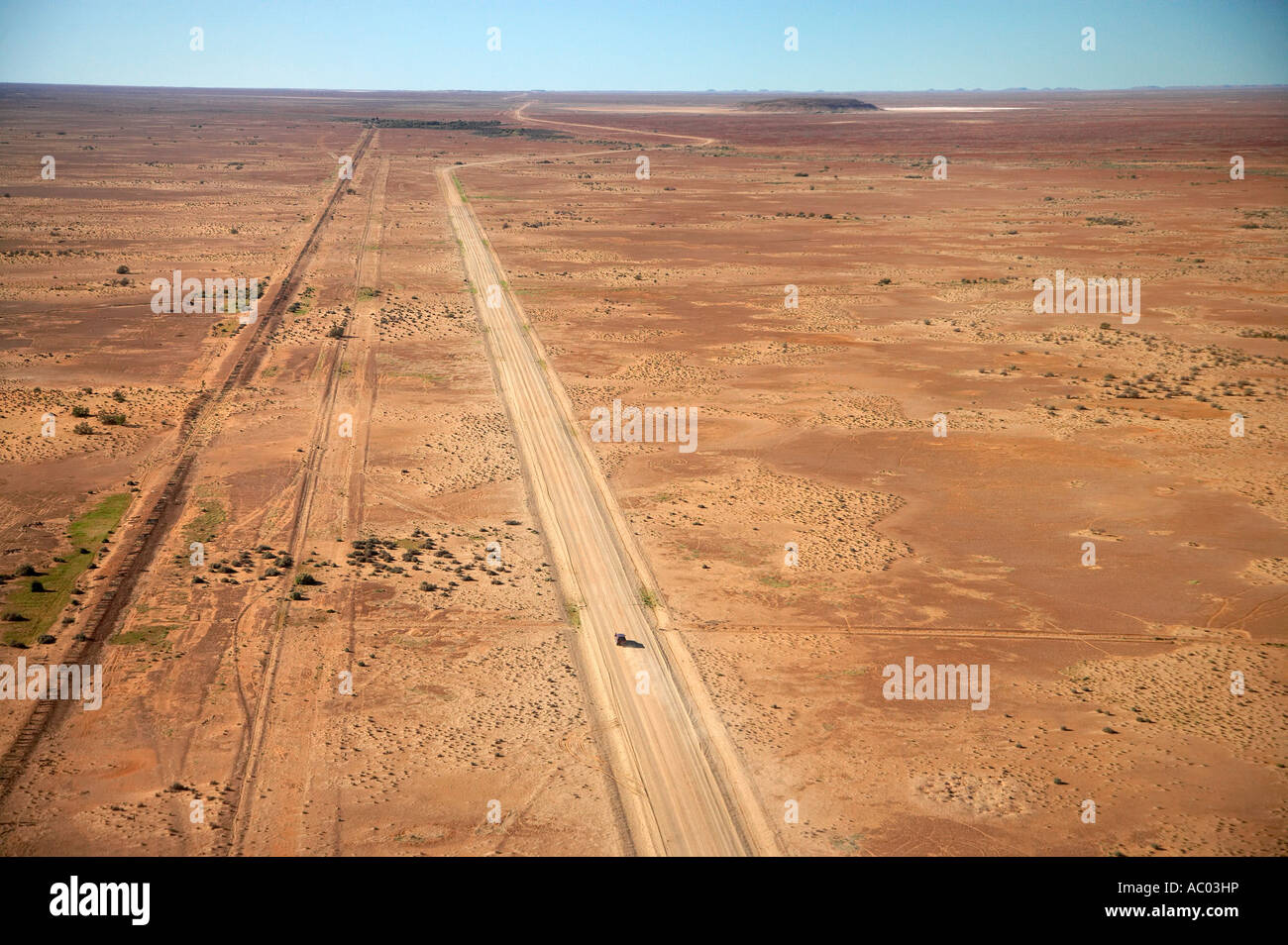 Oodnadatta Track and Old Ghan Train Line near William Creek Outback South Australia Australia aerial Stock Photo