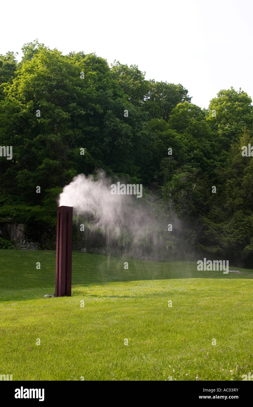 A fountain spraying a mist of water Stock Photo Alamy
