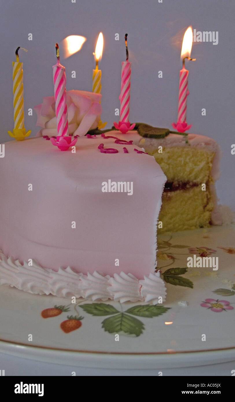 Candles on a birthday cake Stock Photo Alamy