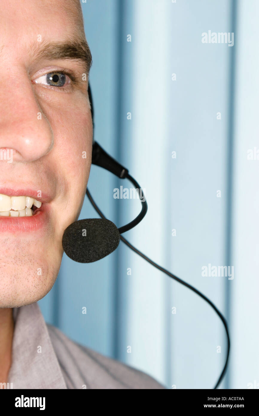 Mann spricht in Headset Mikrofon Detail detail of talking man with headset and microphone Stock Photo