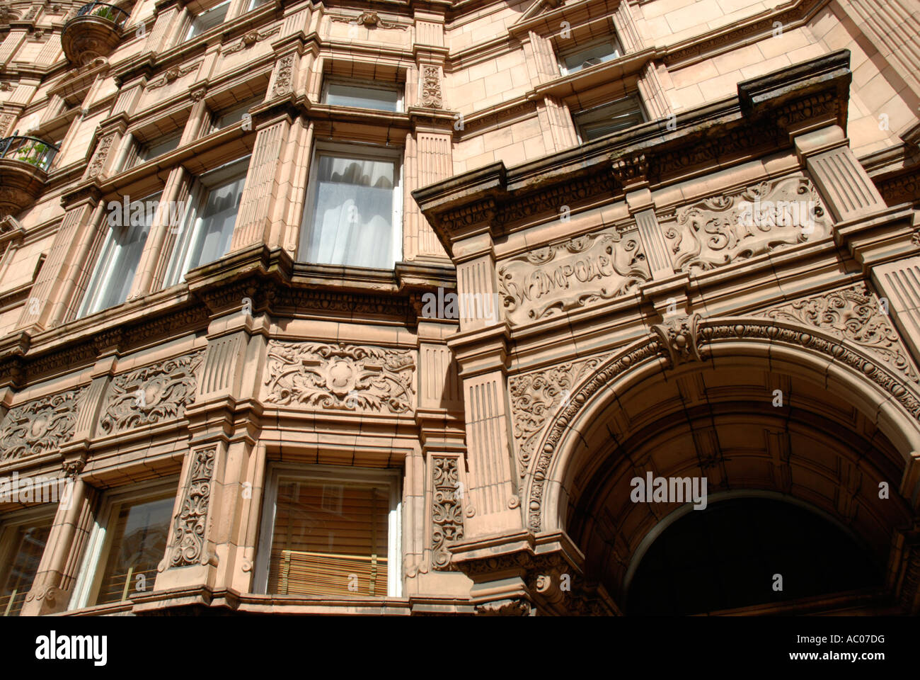 Exterior of Wimpole House ornate terracotta stone building in Wimpole