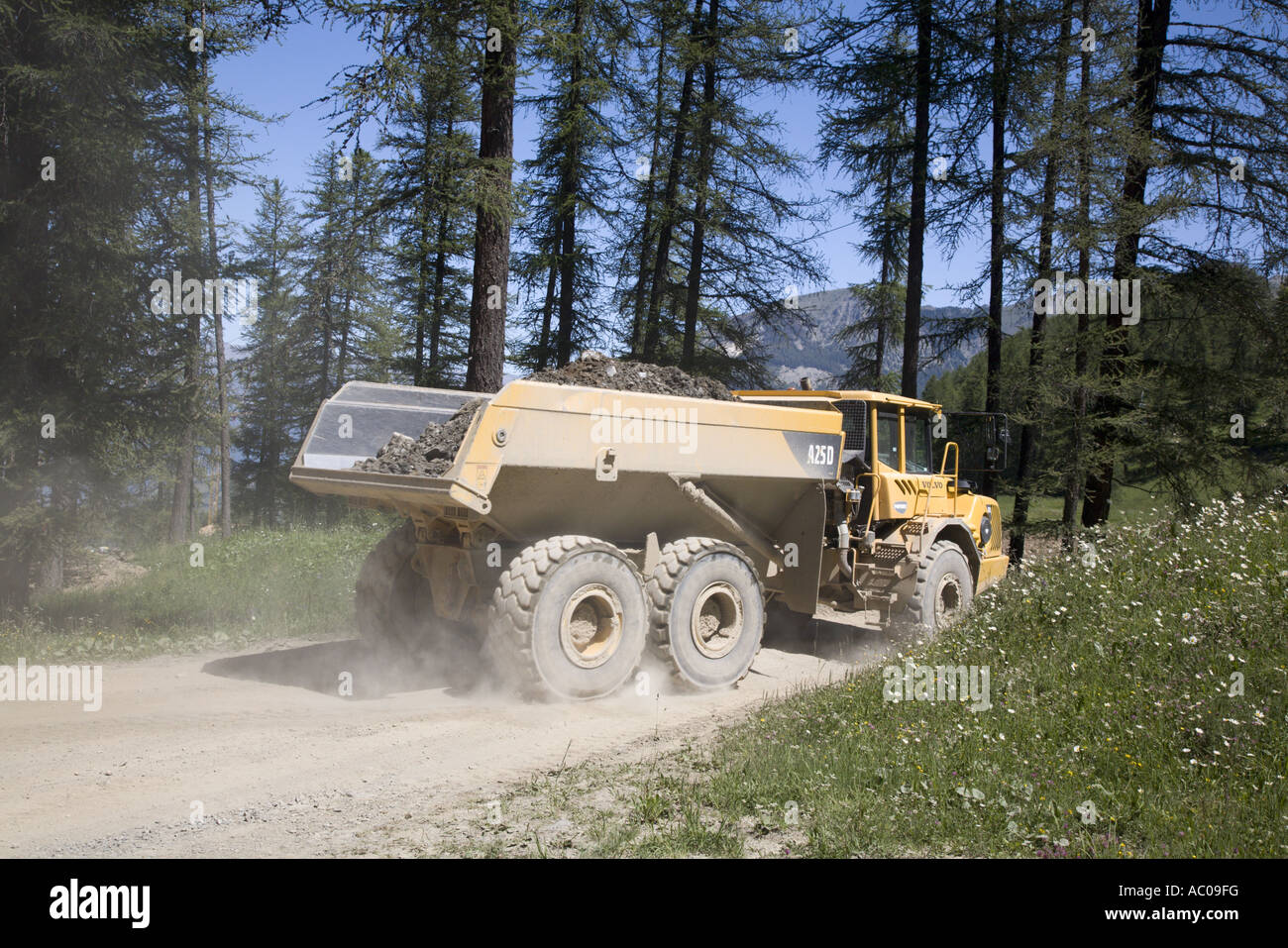 Big lorry for transport of sand and rocks, Les Orres, Hautes Alpes, Provence, France Stock Photo