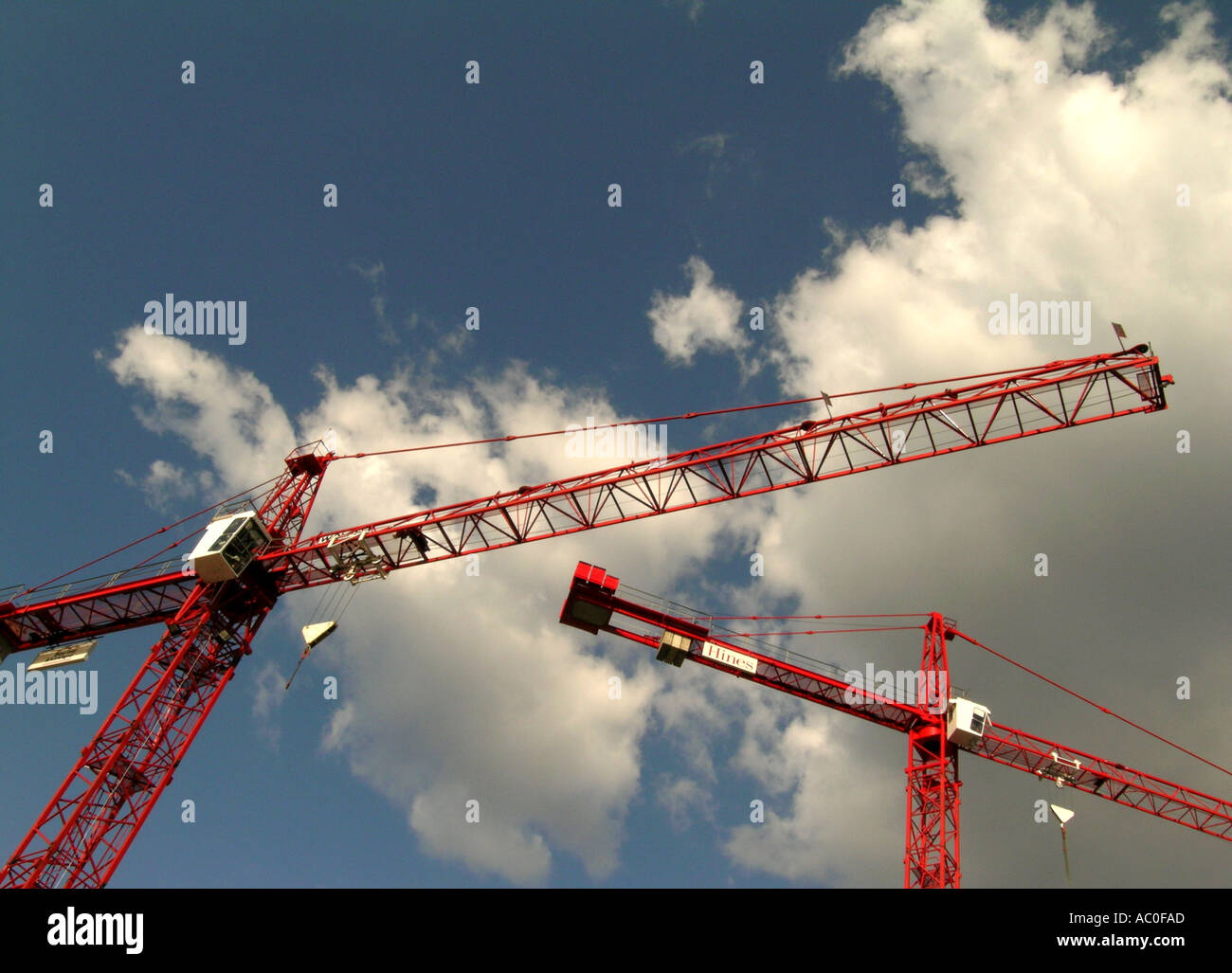 day 2 Red construction cranes on building site Stock Photo