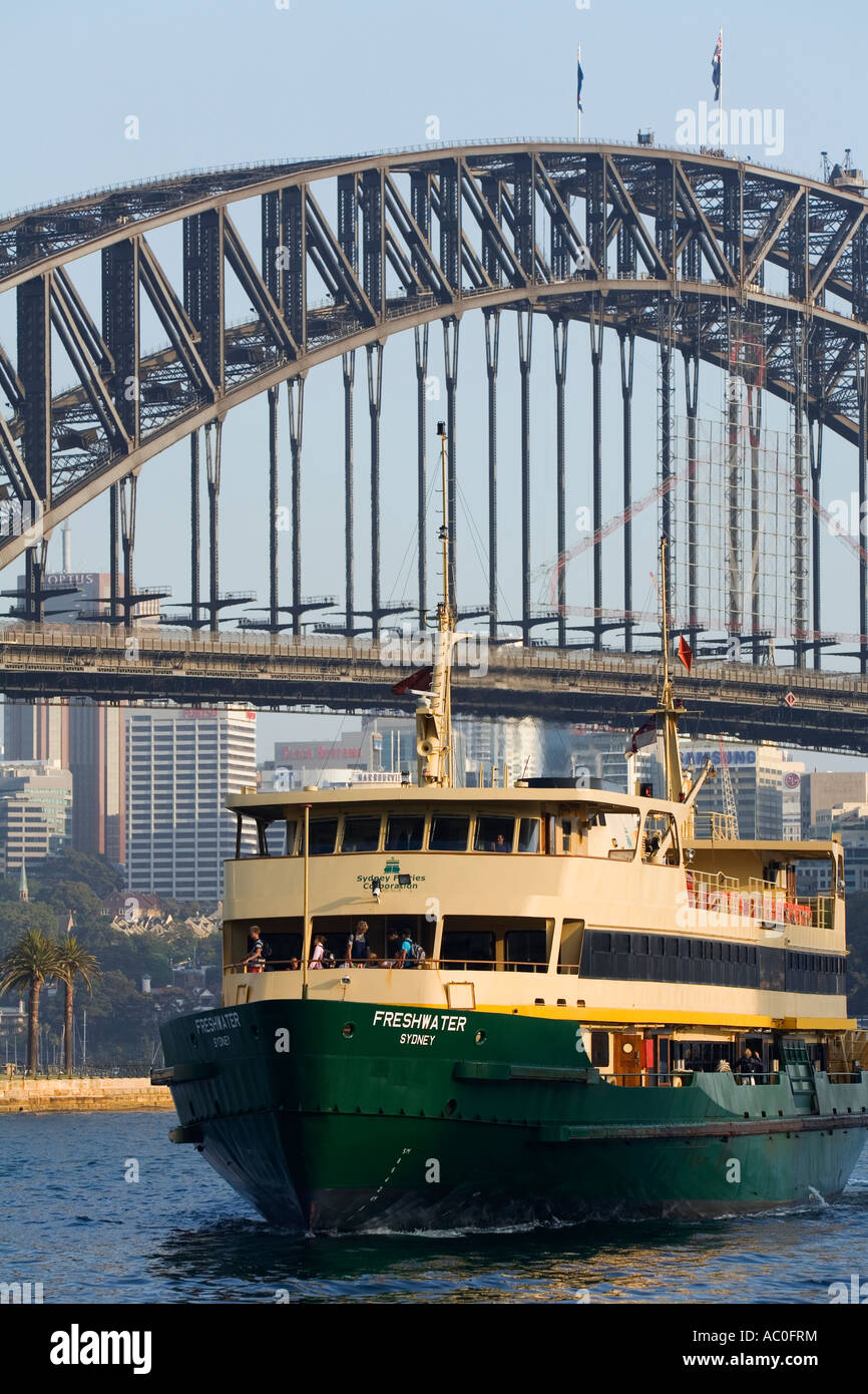 The Manly passenger ferry enters Sydney Cove bound for the wharf at Circular Quay Stock Photo
