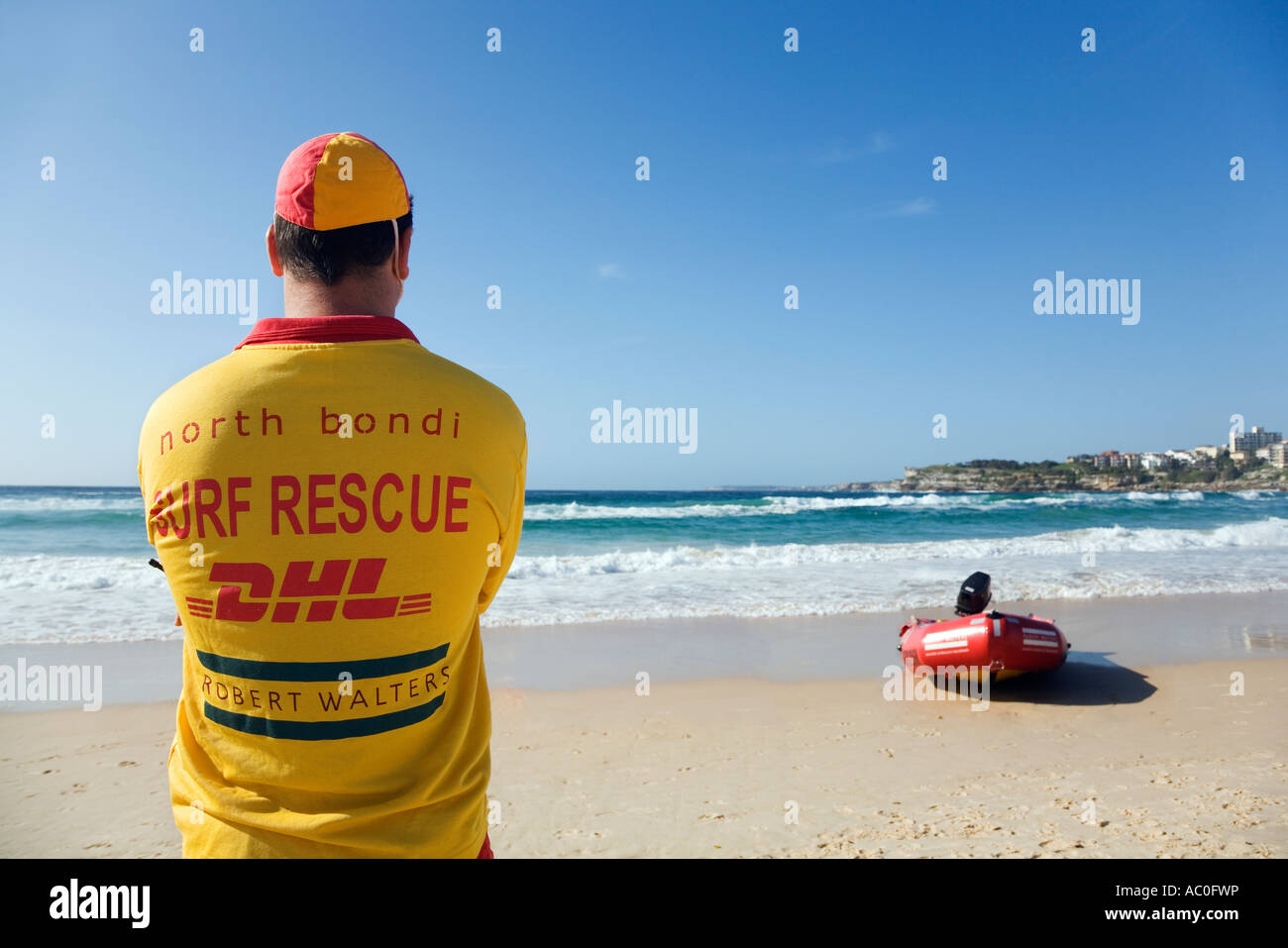A lifesaver watches the surf on Bondi Beach in eastern Sydney Lifesavers are a common sight on Australian beaches Stock Photo
