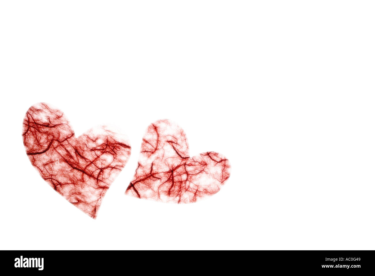 Red paper hearts on bright white background Stock Photo - Alamy