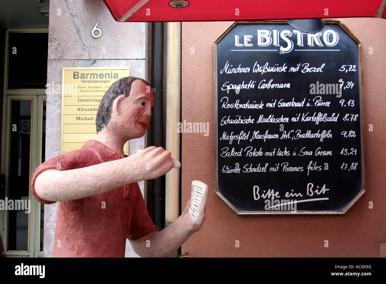 Restaurant menu and mannequin waiter, Germany Stock Photo