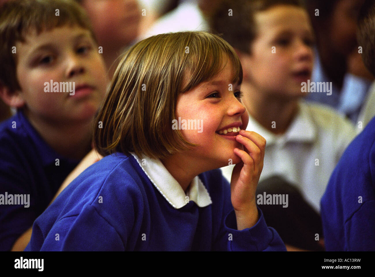 CHILDREN AT MANOR PRIMARY SCHOOL WOLVERHAMPTON UK ENJOYING THE CADBURYS