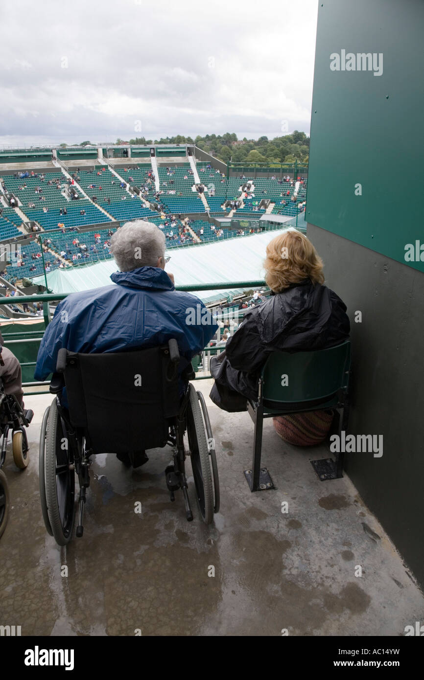 disabled spectator at Wimbledon tennis Championship UK Stock Photo