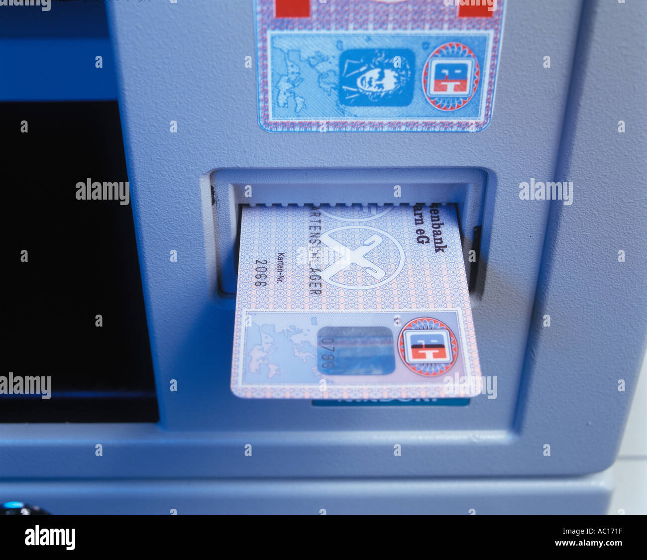 EC Card in cash machine automated teller machine Stock Photo