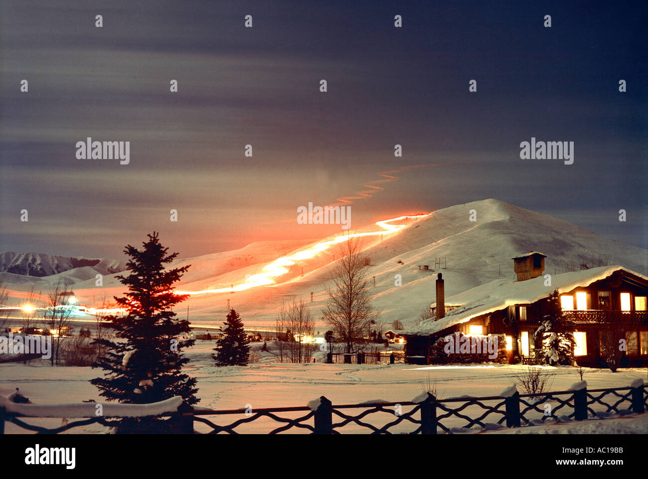 Skiers create a Christmas Eve Torchlight Parade down Dollar Mountain at