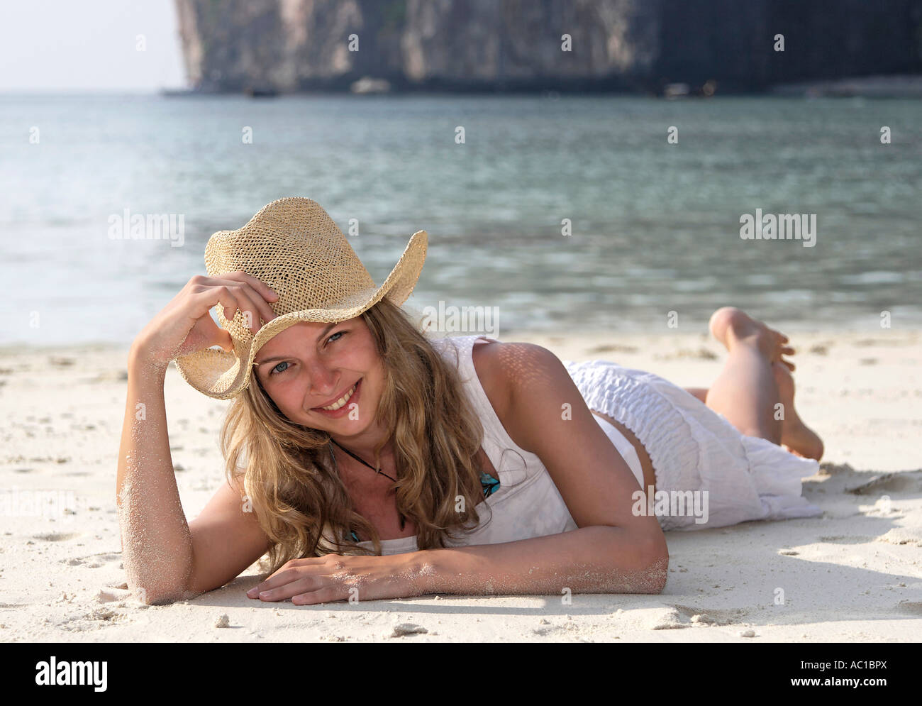 Resting head on arm woman hi-res stock photography and images - Alamy