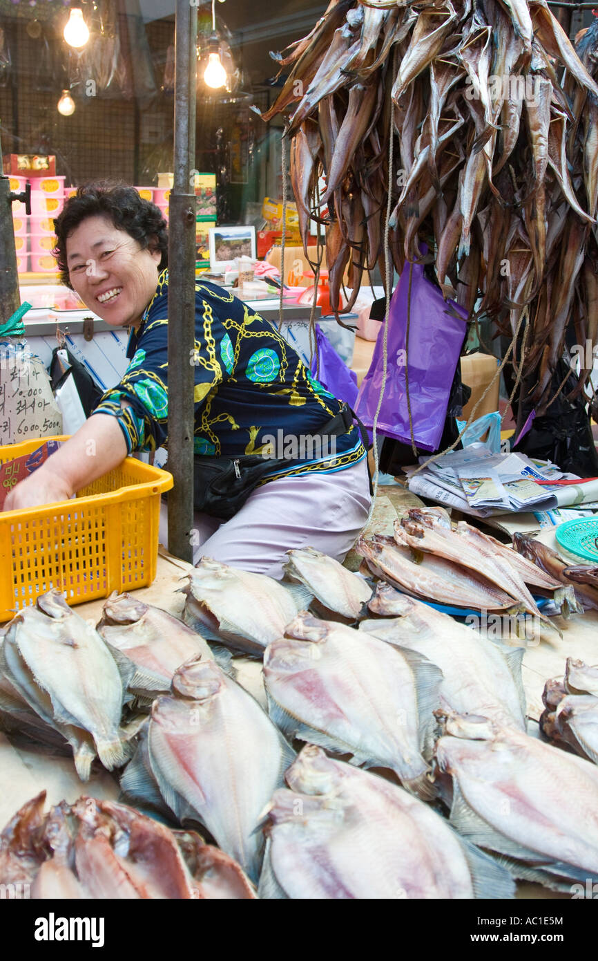 Korean Woman Selling Dried Fish in Market Shop Sokcho South Korea Stock