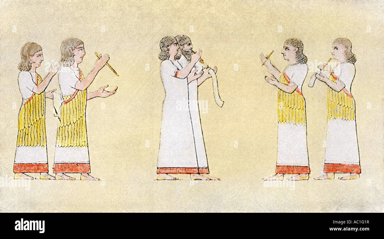 Assyrian or Babylonian scribes using flexible media as well as clay tablets for cuneiform writing. Hand-colored halftone of an illustration Stock Photo