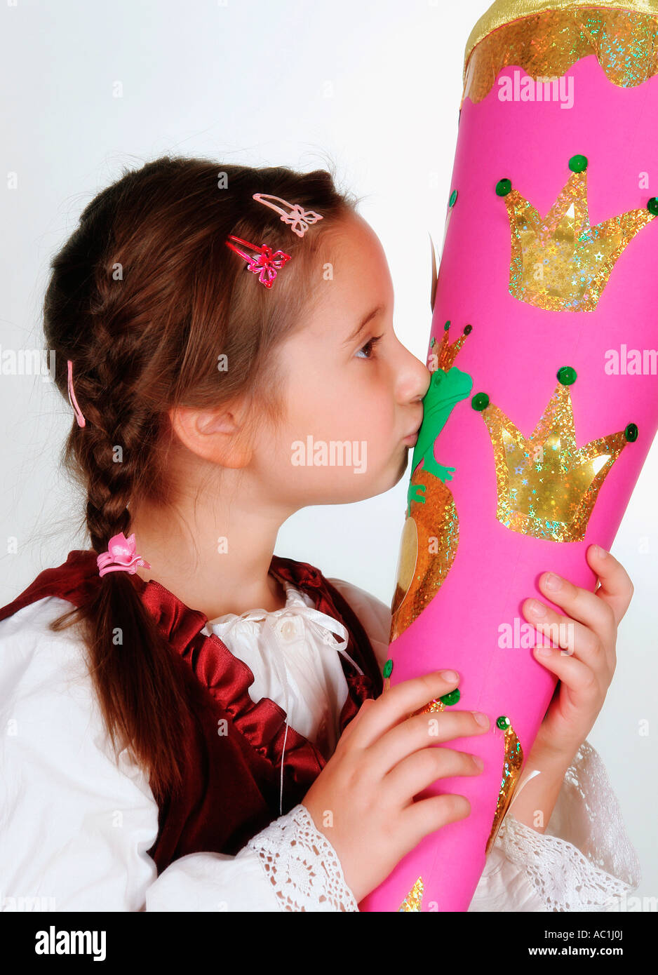 Girl kissing scholl cone Stock Photo