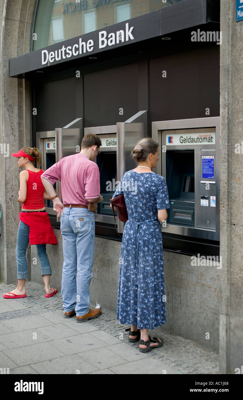 People At A Deutsche Bank Teller Machine Munich Bavaria Germany Stock Photo Alamy