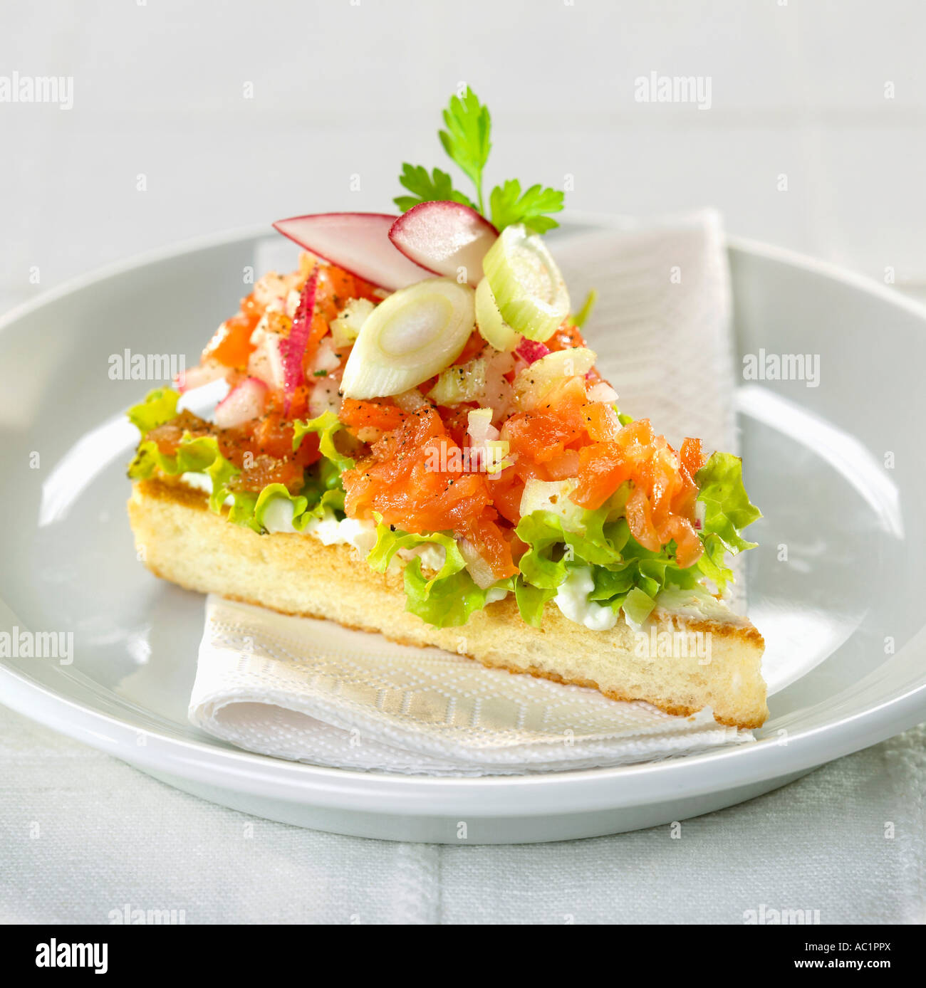 Canape with salmon Stock Photo - Alamy