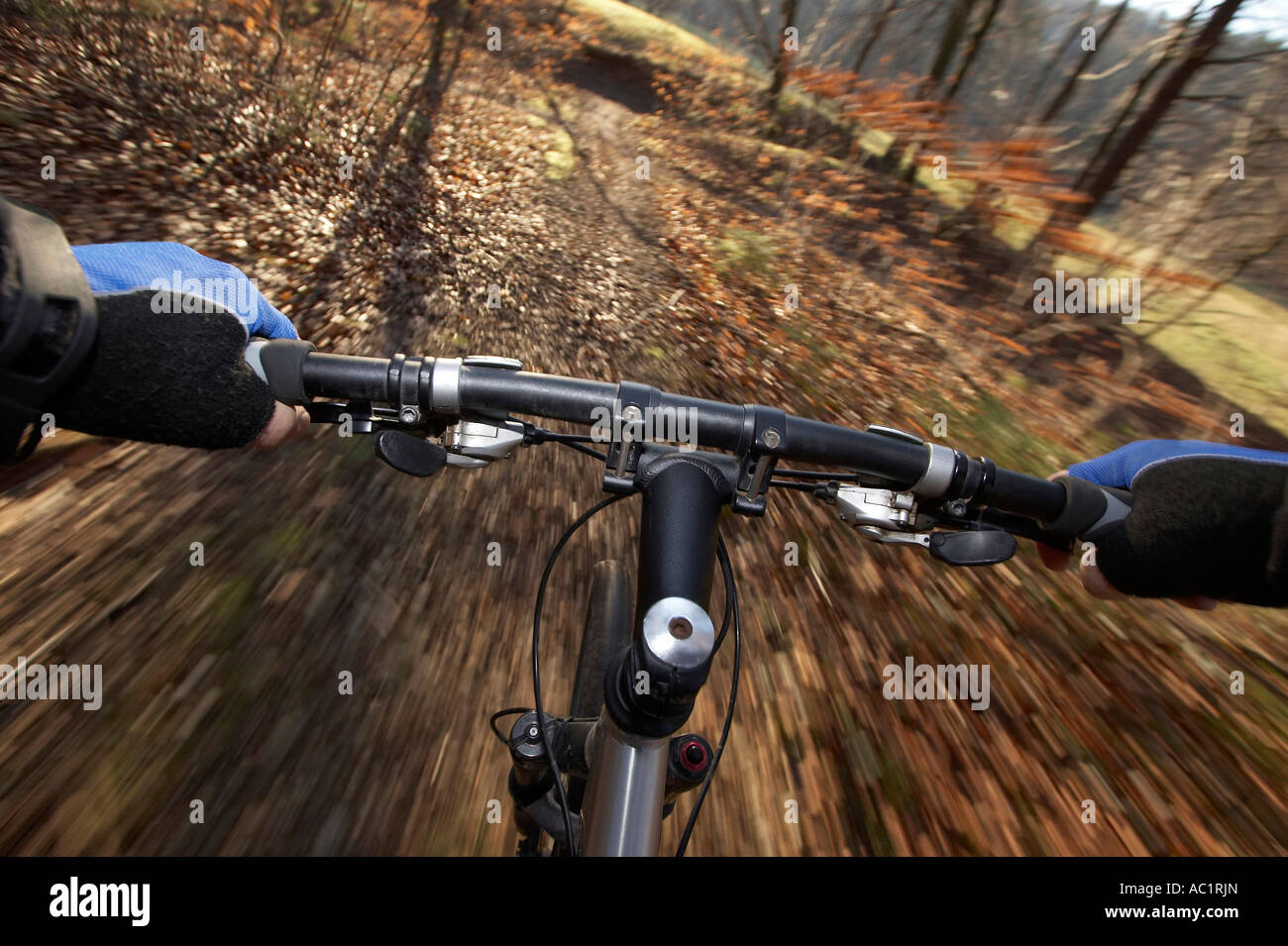 Handle bar of driving mountain bike, blurred motion Stock Photo Alamy