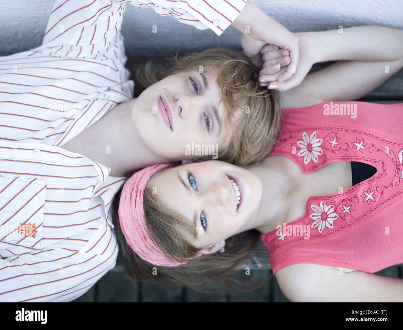 Two teen boys holding hands hi-res stock photography and images - Alamy