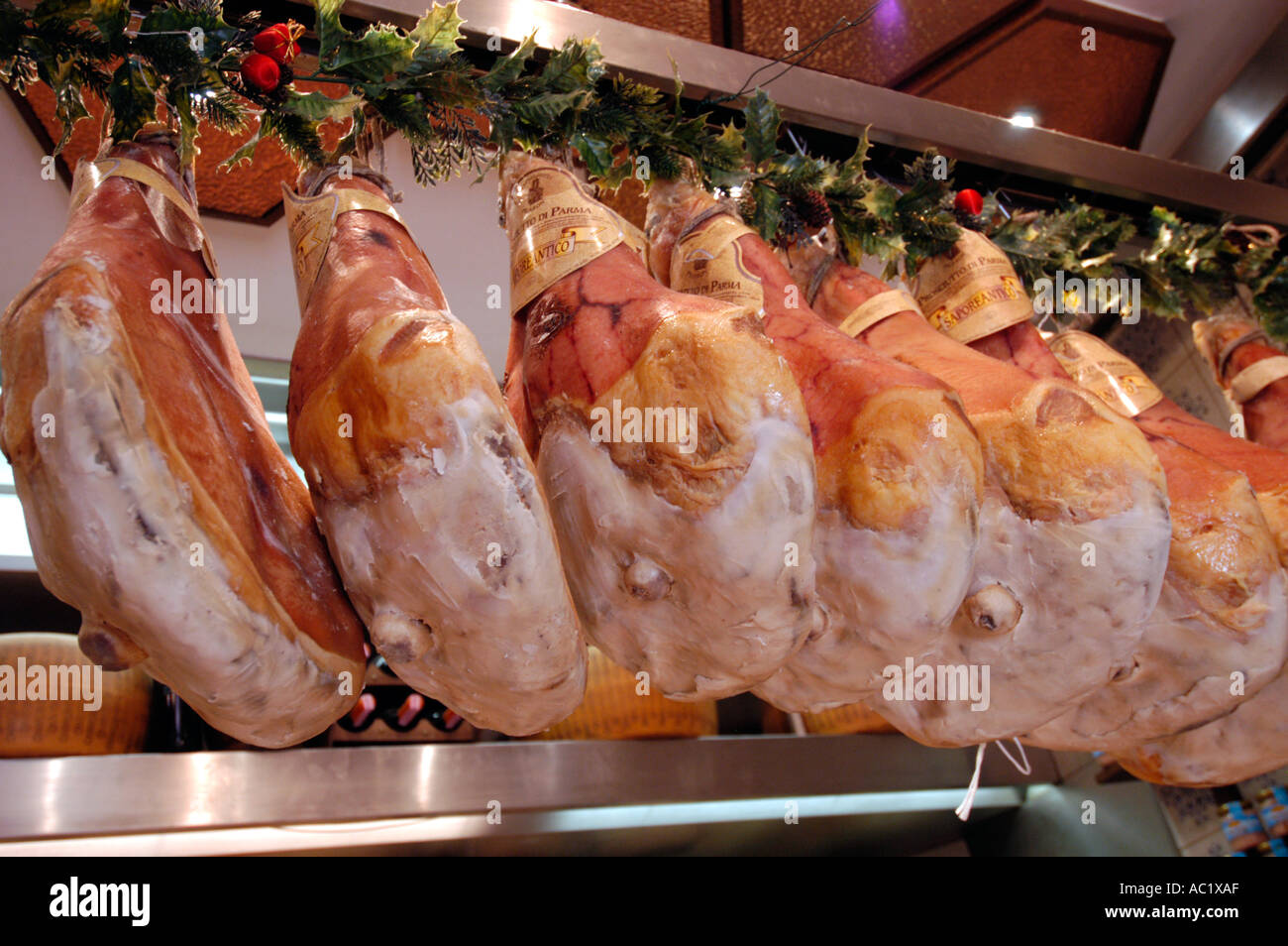 Parma hams in a deli, Rome, Italy Stock Photo