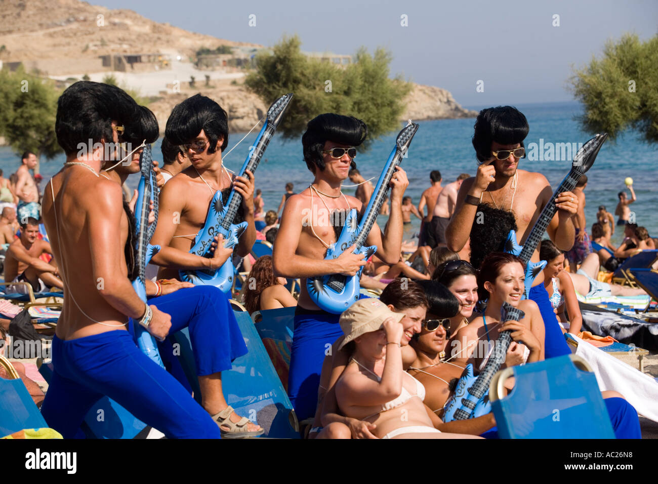 Group of club representative during a Club Promotion Paradise Beach Mykonos Greece Stock Photo