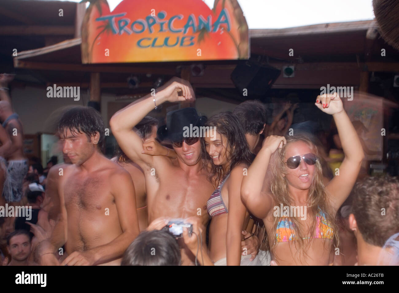 Young people dancing during a beach party of the Tropicana Club Paradise Beach Mykonos Greece Stock Photo