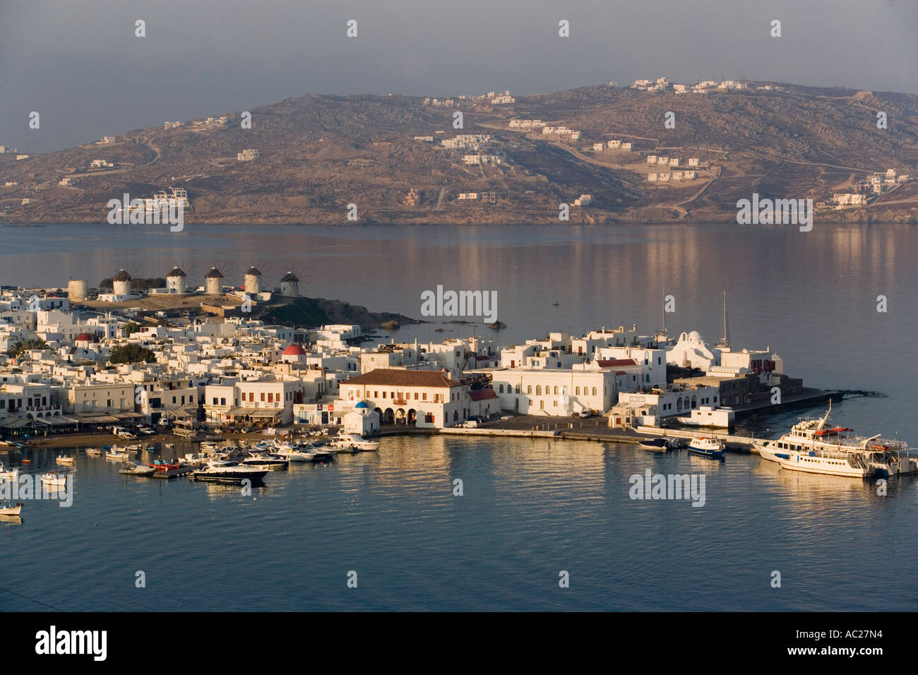 Aerial view of the harbour with windmills and ships Mykonos Town Mykonos Greece Stock Photo