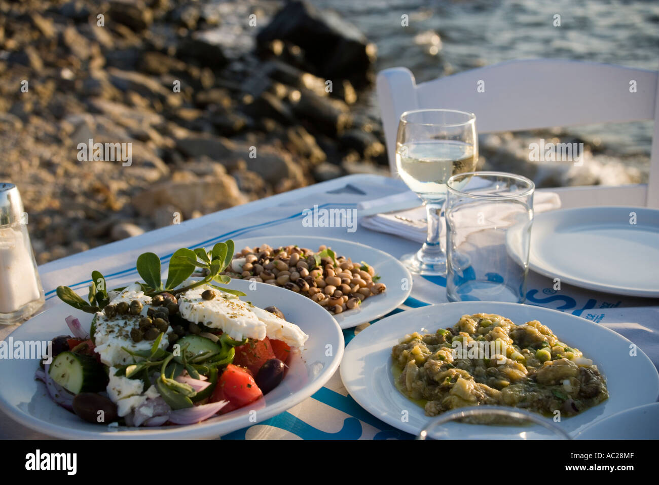Different greek starters including salat served in the Sea Satin Market Restaurant Mykonos Town Mykonos Greece Stock Photo