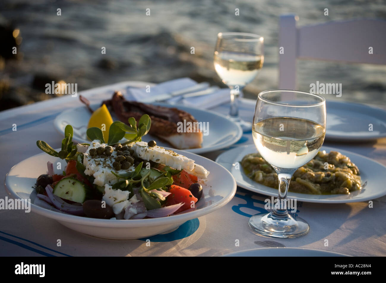 Different greek starters including salat served in the Sea Satin Market Restaurant Mykonos Town Mykonos Greece Stock Photo