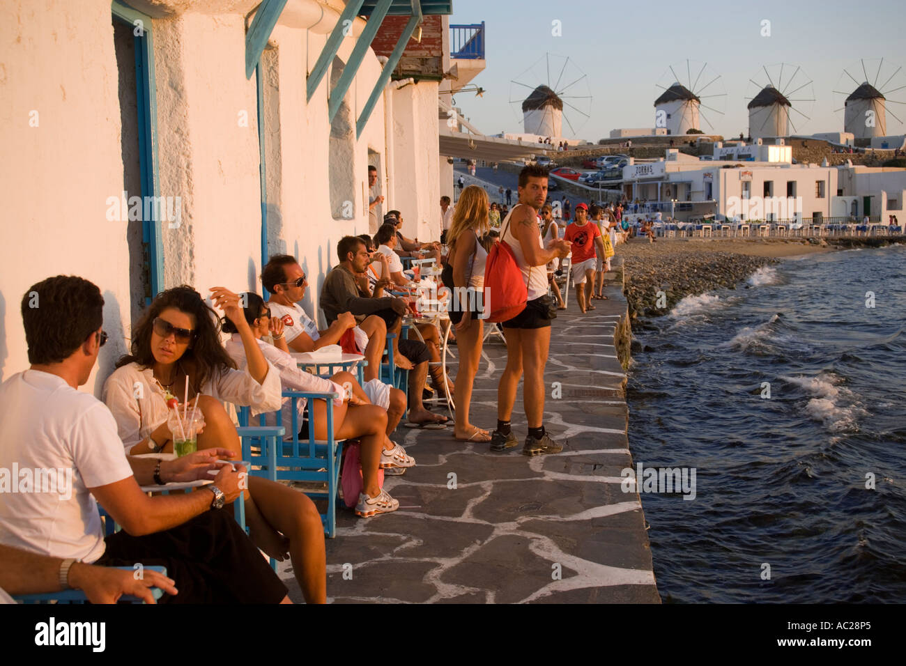 People sitting in Caprice Bar directly at sea Little Venice Mykonos Town  Mykonos Greece Stock Photo - Alamy