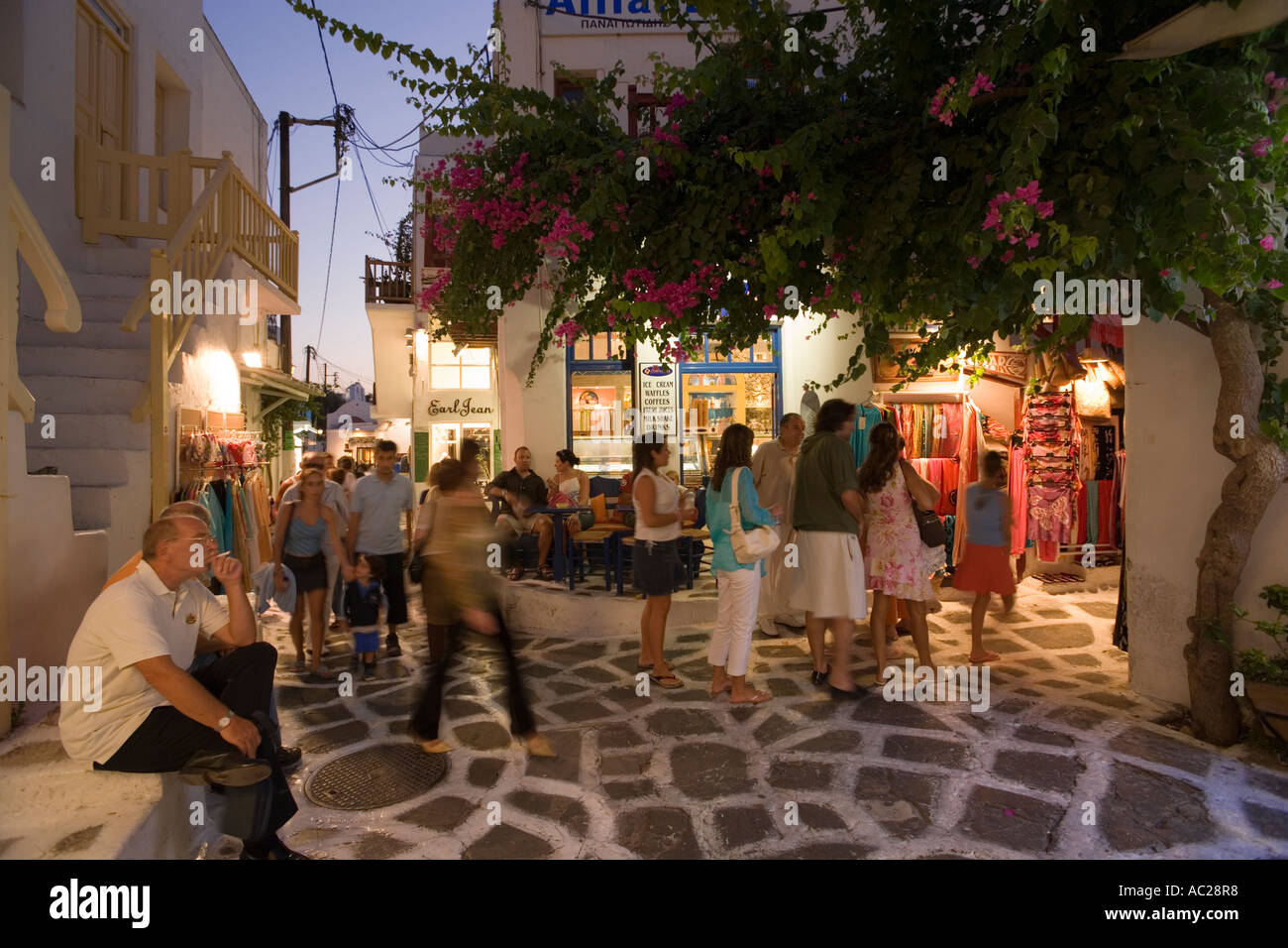 People strolling over shopping street Mykonos Town Mykonos Greece Stock Photo
