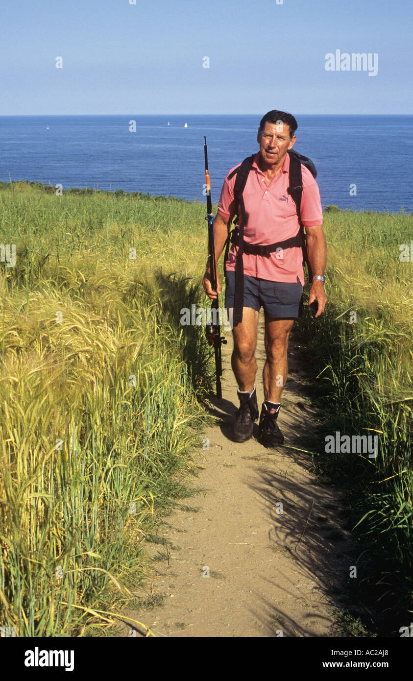 Man on fishing trip, Porthbeor, The  Roseland Peninsula, Cornwall, UK Stock Photo