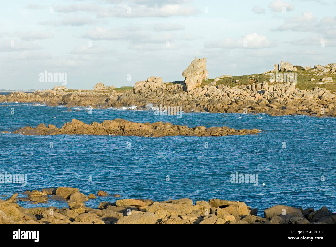 sea Atlantic Ocean with granit rocks at the coast in Finistere Brittany ...