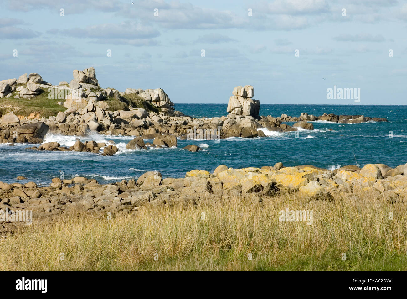 sea Atlantic Ocean with granit rocks at the coast in Finistere Brittany ...
