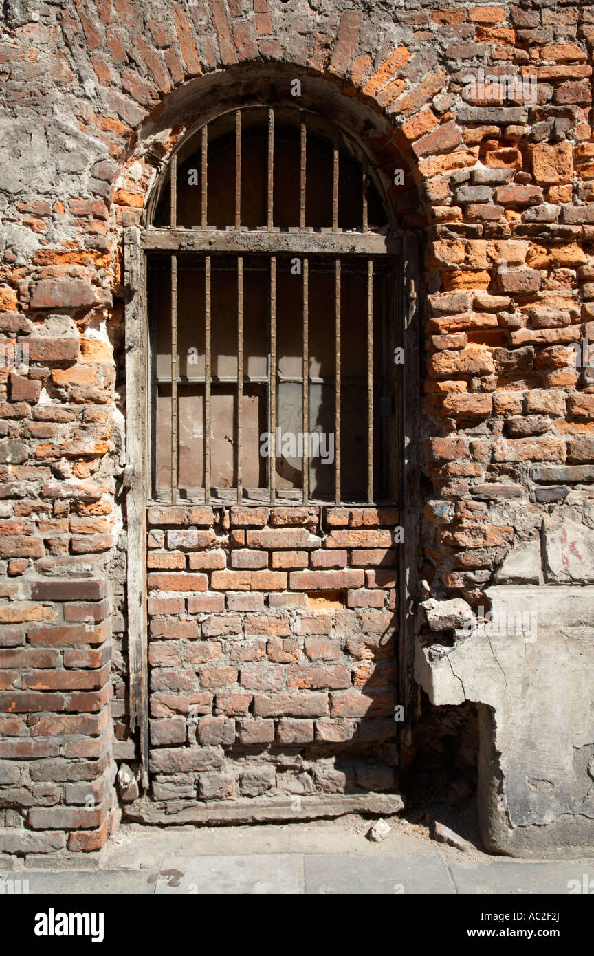 old wooden framed window with weathered steel bars door replacement in ...