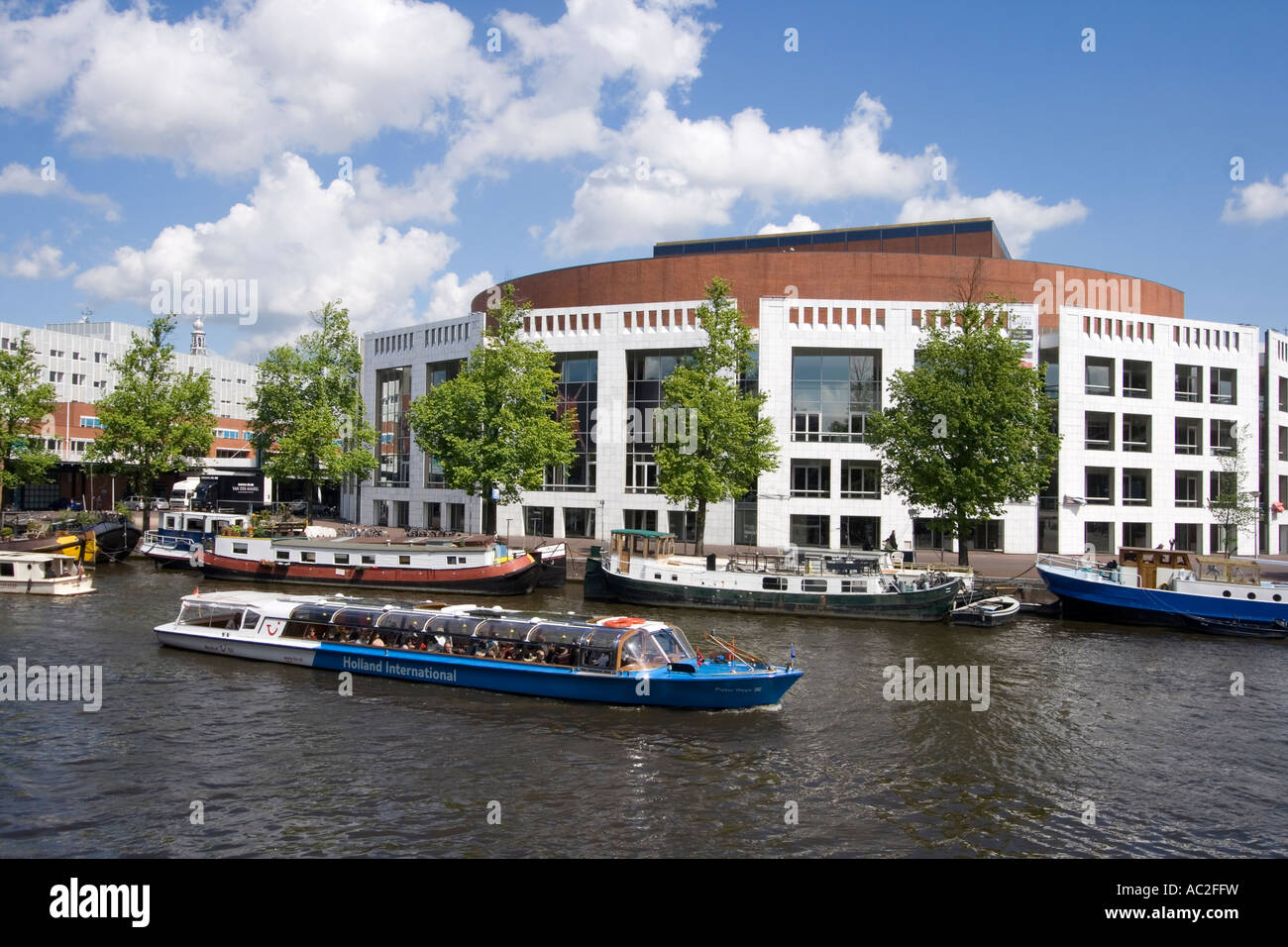 Amsterdam opera house canal boat Stock Photo