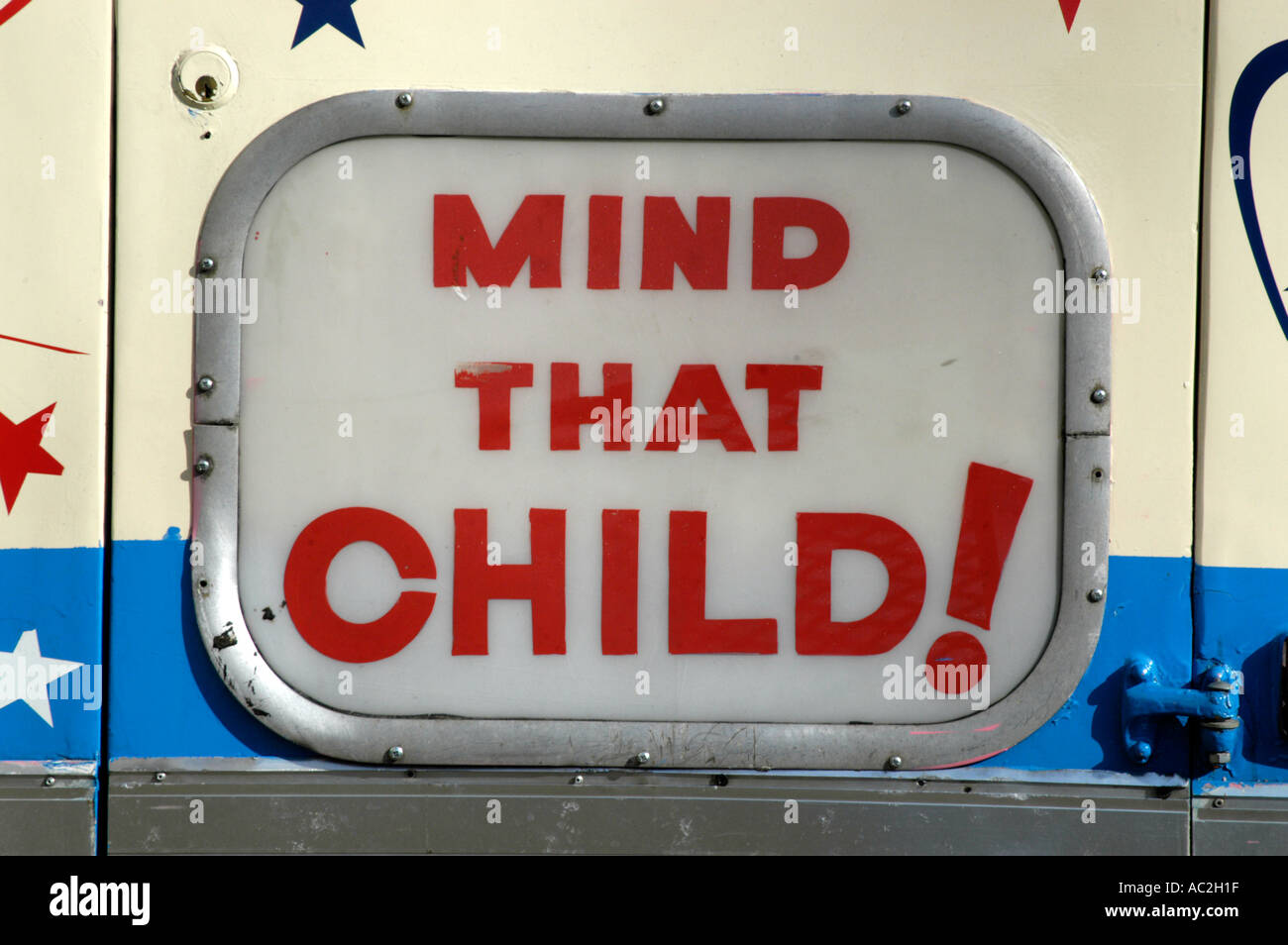 Mind That Child sign on back of ice cream van, England UK Stock Photo