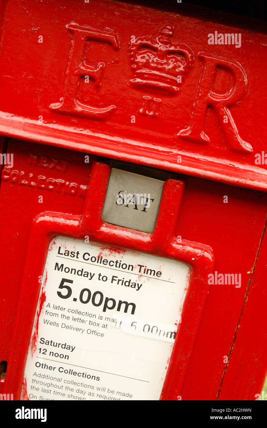Royal Mail red post box postbox with postal collection service times