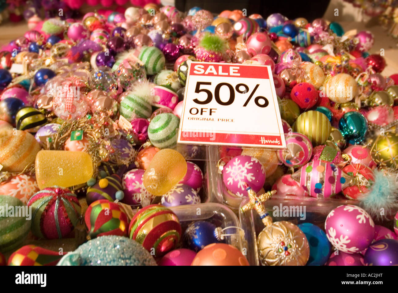 Sale Sign on Display of Colourful, Christmas Baubles in Harrods Stock Photo