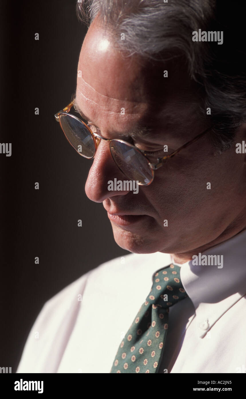 Pensive older man thinking candid hi-res stock photography and images ...