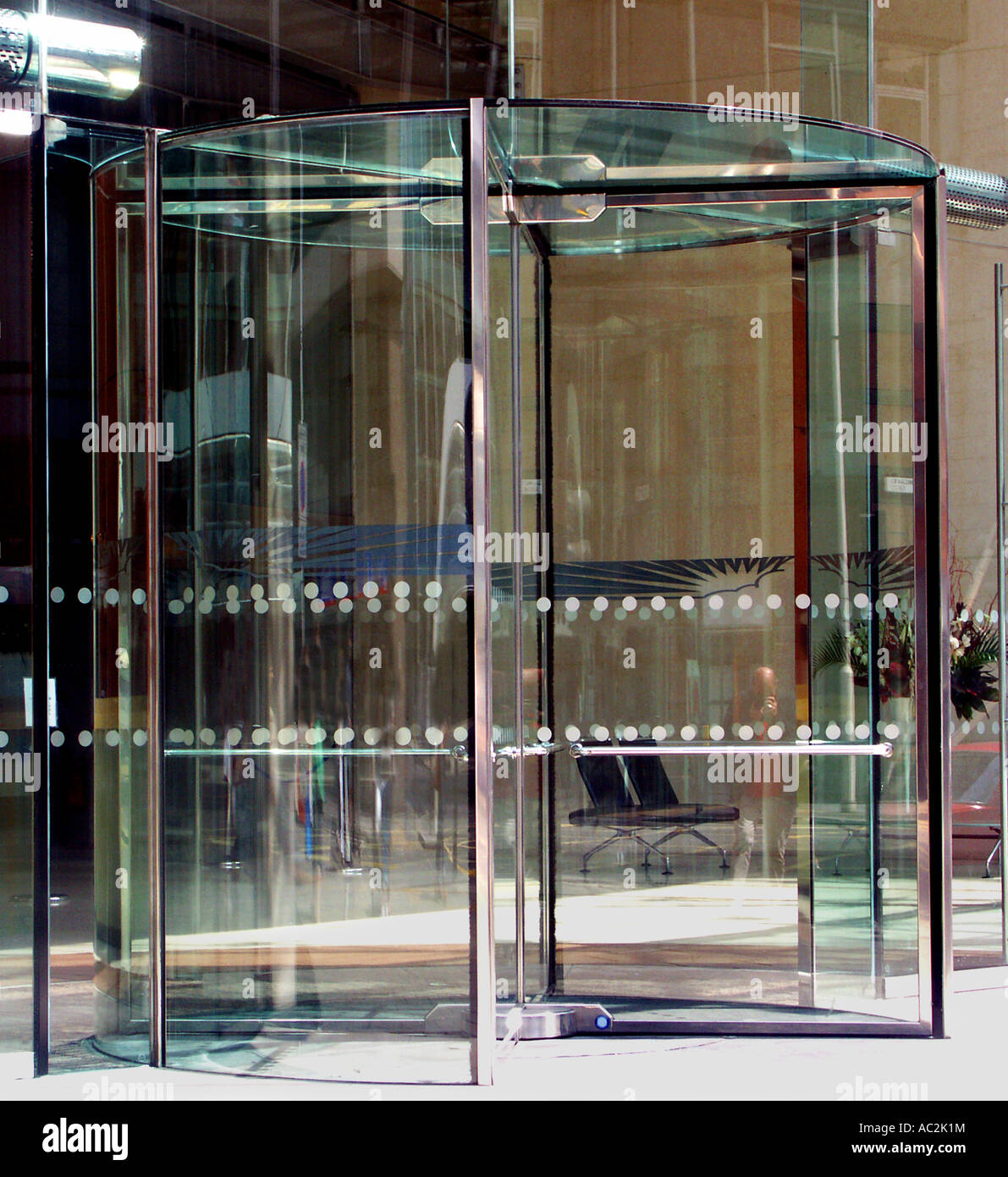 Glass revolving door entrance. Stock Photo