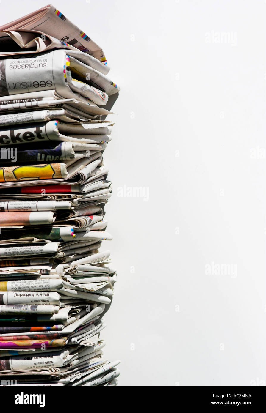 Close-up of a pile of stacked newspapers. Stock Photo